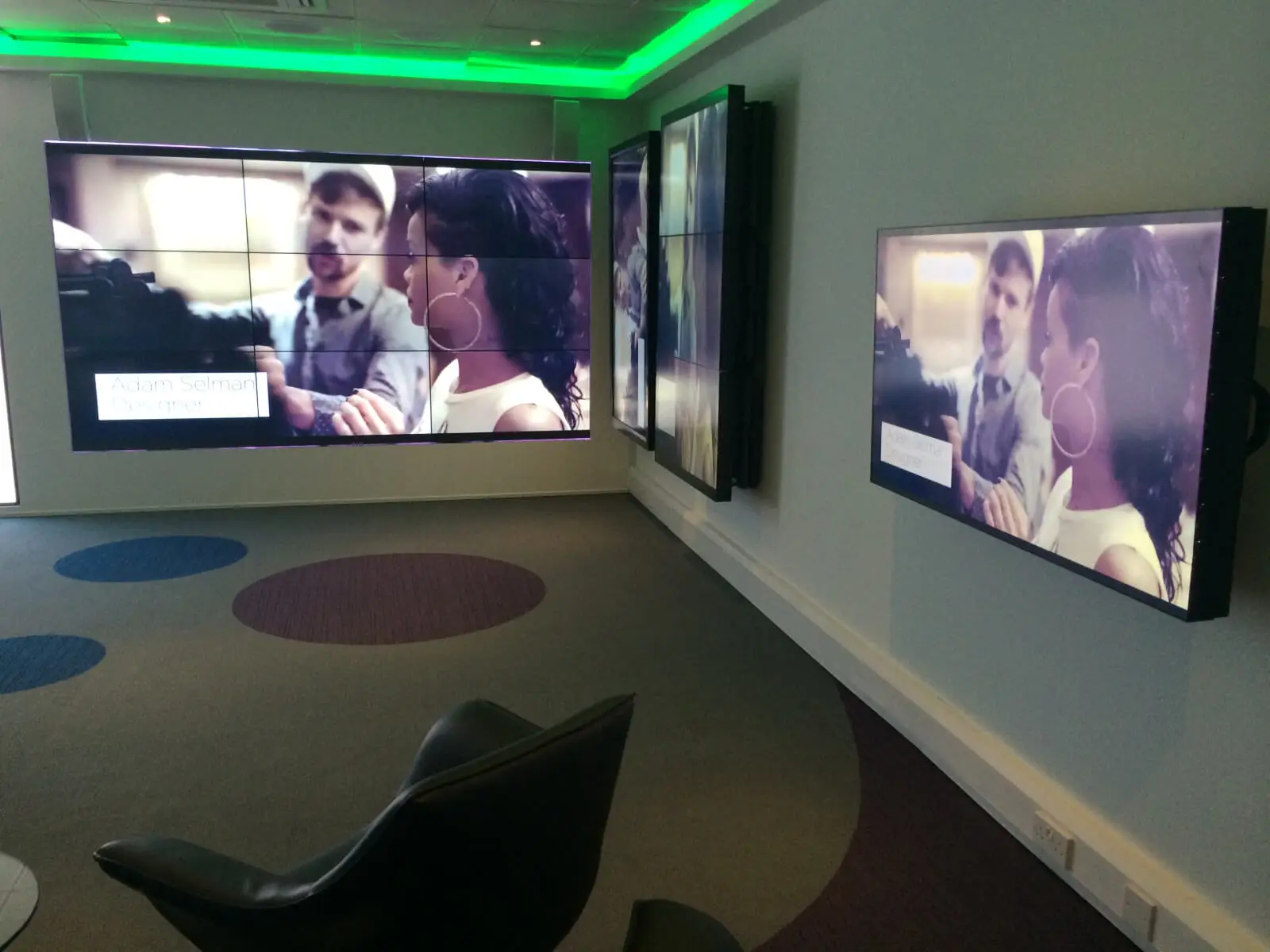 PEL UK Offices space with designer furniture and wall mounted digital screens 14